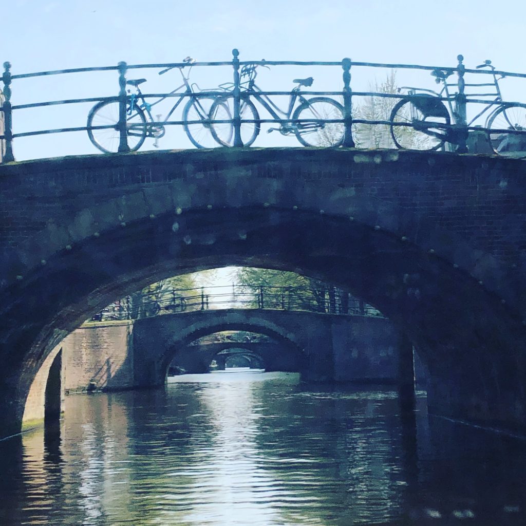 Bike on canal bridge, Amsterdam. Photo by J.F.Penn