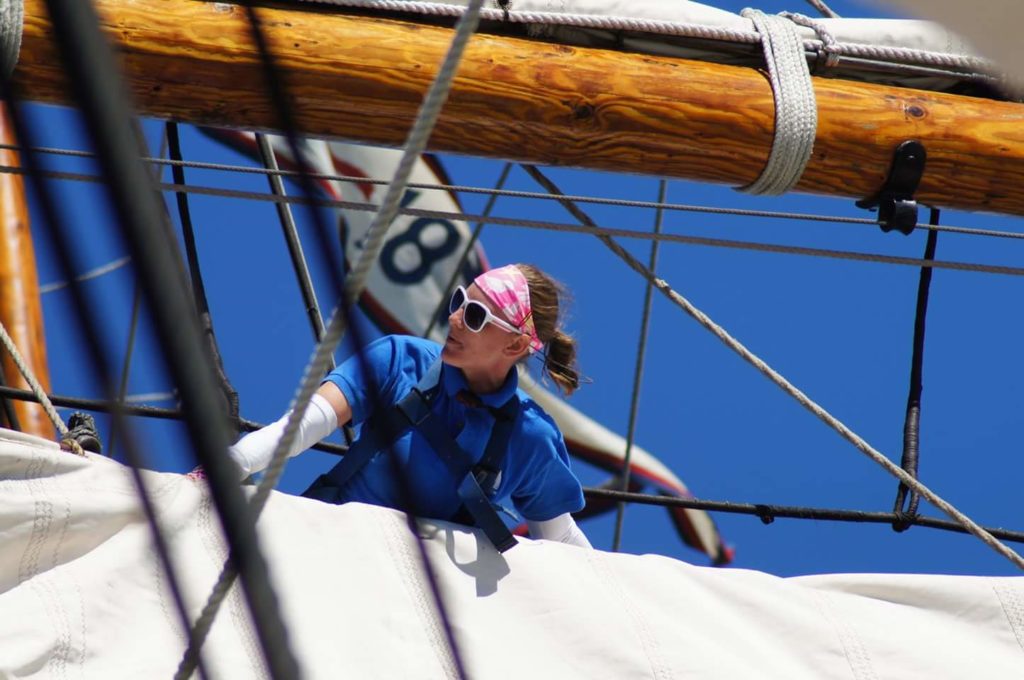 furling the main lower topsail on a daysail.