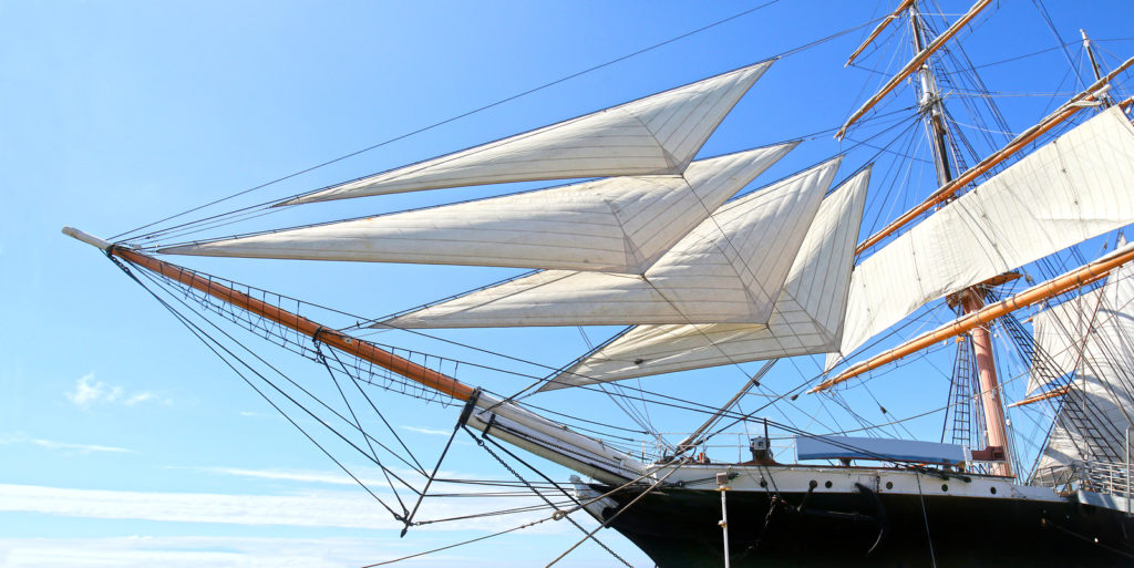 Panoramic Photo of Sails from a tall Ship in Dock. San Diego, USA. Sunny day.