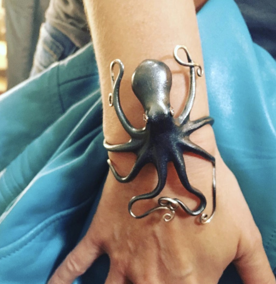 J.F.Penn wearing silver octopus bracelet from Icarus jewelry, Bath, UK