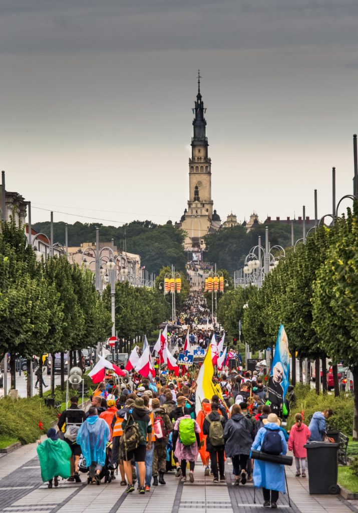 Pilgrims arriving in Czestochowa for Assumption feast Day at Jasna Gora Monastery. Photo copyright Derry Brabbs. Used with permission.