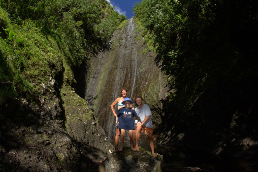 Fatu Hiva: Happy family in front of waterfall. Photo by Nadine Slavinski