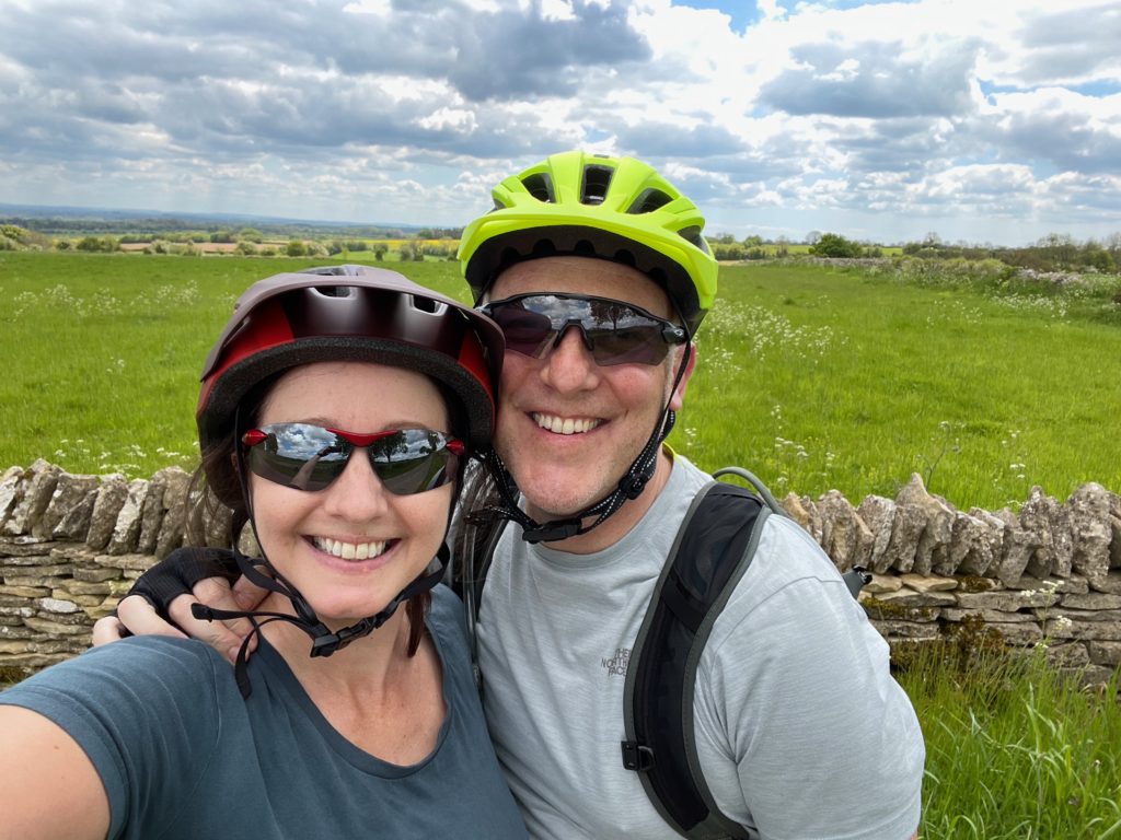 Happy cycling couple in the Cotswolds, May 2021
