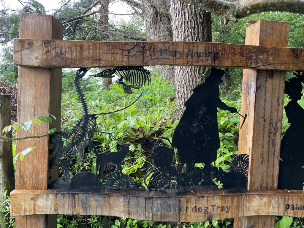 Mary Anning on a fence on the SW Coast Path. Photo by JF Penn