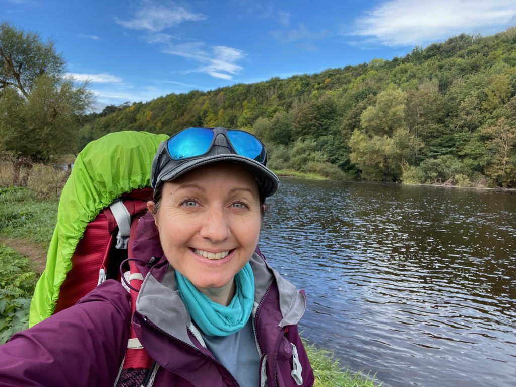 J.F. Penn walking by the River Tweed on the St Cuthbert's Way