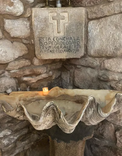 Shell font in church on Portuguese Camino route. Photo by Imogen Clark