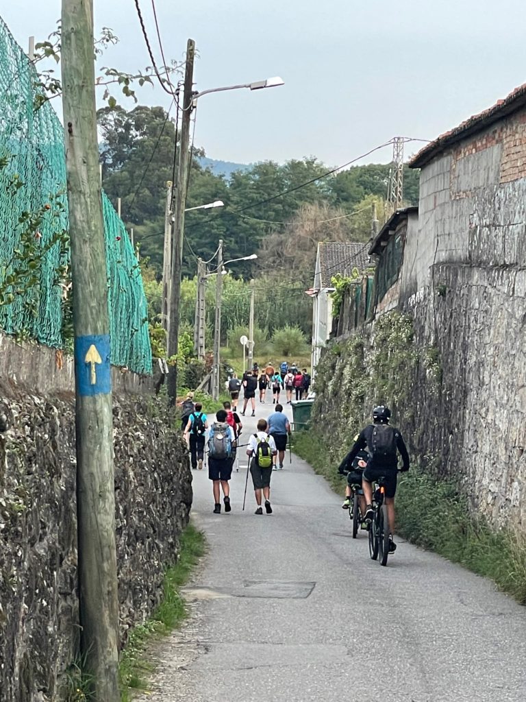 Pilgrims leaving Pontevedra on the Camino