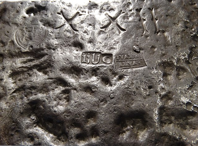 Detail of 16-Pound Silver Bar, probably from Mines of Potosi - 16th Century. Adam Jones from Kelowna, BC, Canada, CC BY-SA 2.0 via Wikimedia Commons