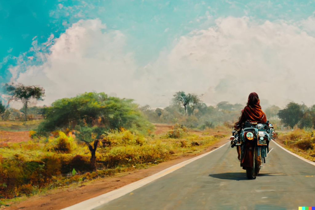 woman riding a motorbike in an Indian landscape