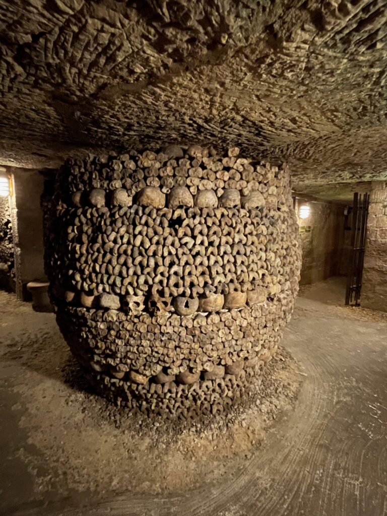 Paris catacombs pillar of bones, Photo by JFPenn