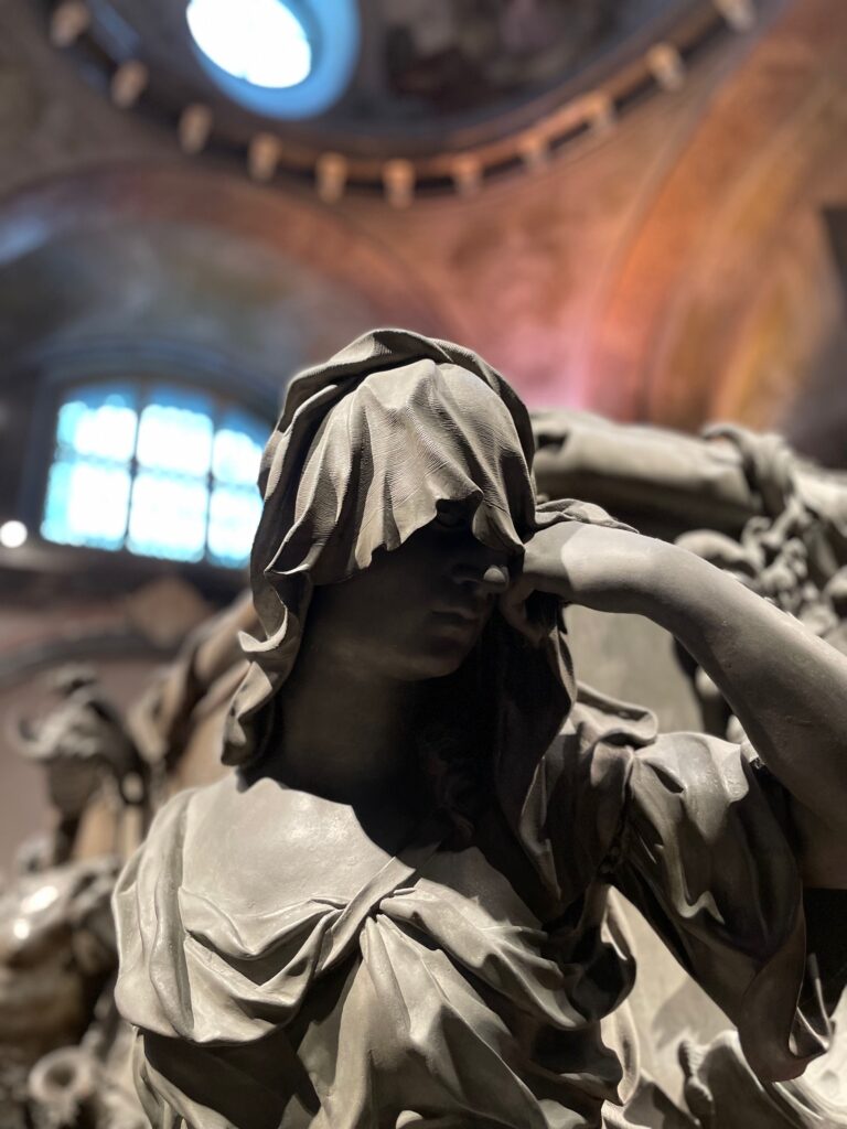 Grieving statue, Habsburg tomb, Capuchin crypt, Vienna. Photo by JFPenn