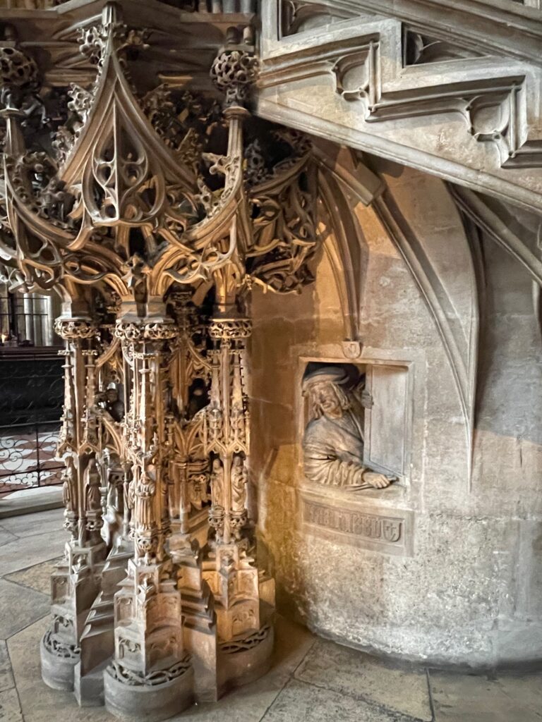 Sculptor under pulpit Stephansdom Vienna Photo by JFPenn