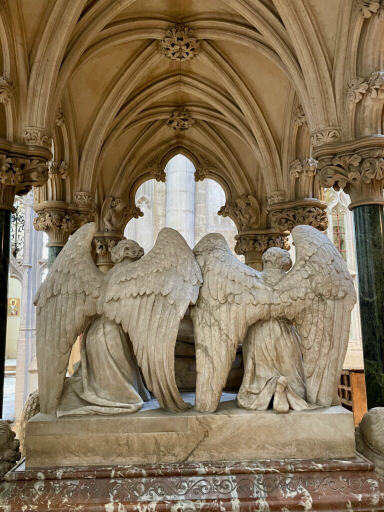 Angels on the Wilburforce tomb Winchester Cathedral Photo by JFPenn
