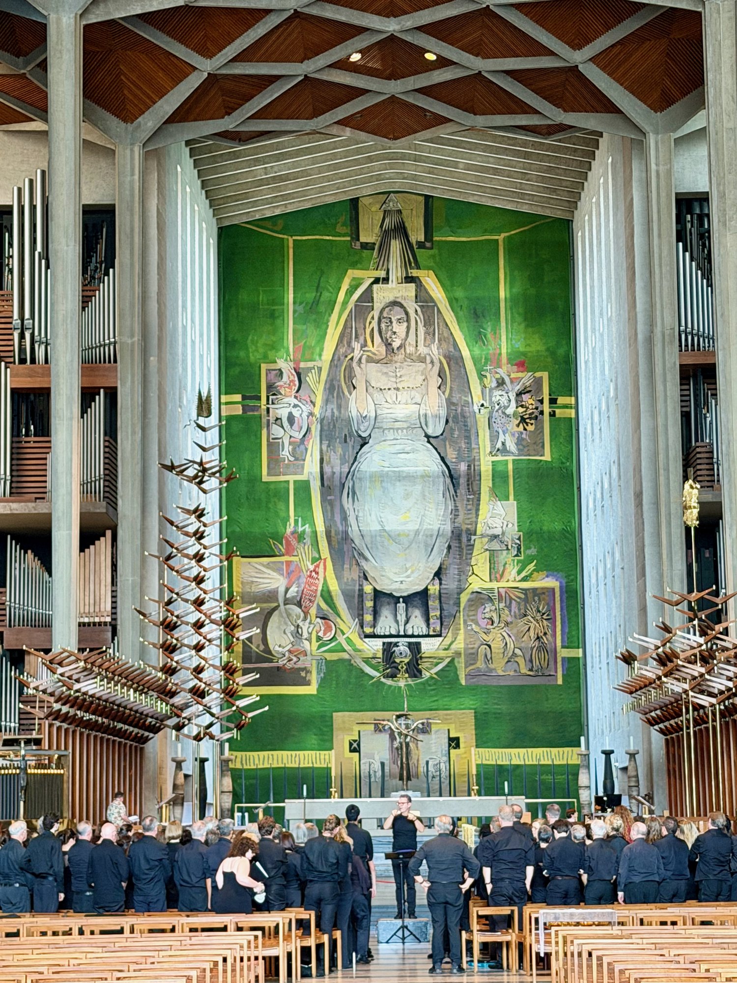 Graham Sutherland's tapestry with a choir rehearsing below, Coventry Cathedral. Photo by JFPenn