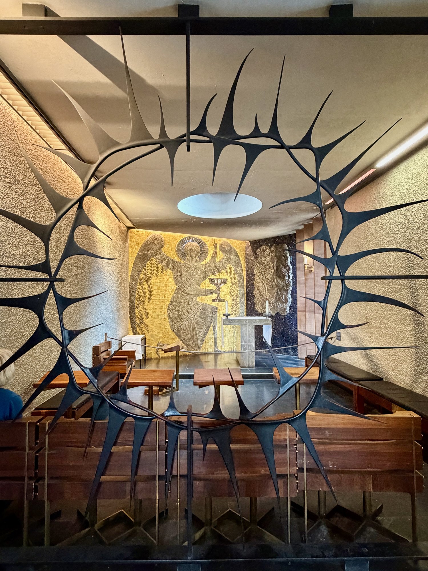 The Chapel of Christ in Gethsemane seen through the crown of thorns screen, Coventry Cathedral. Photo by JFPenn