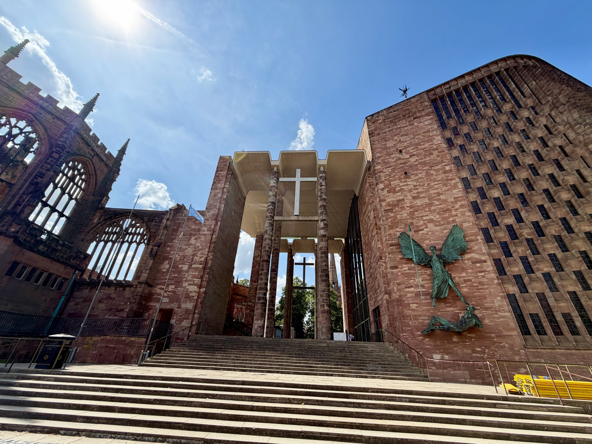 Epstein's St Michael's Victory over the Devil beside the steps, Coventry Cathedral. Photo by JFPenn