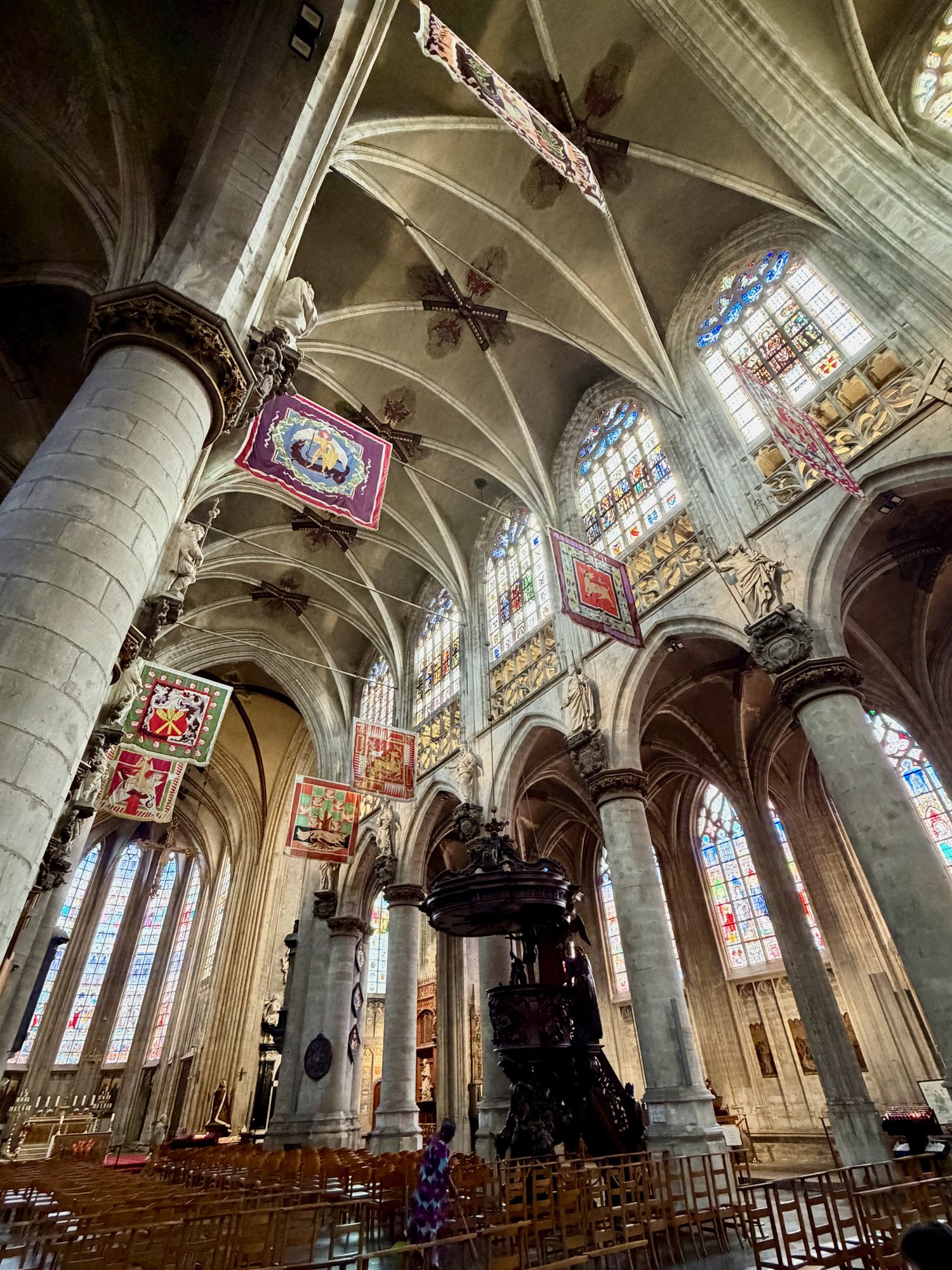 Guild banners in the nave, Church of Our Lady of the Sablon, Brussels. Photo by JFPenn