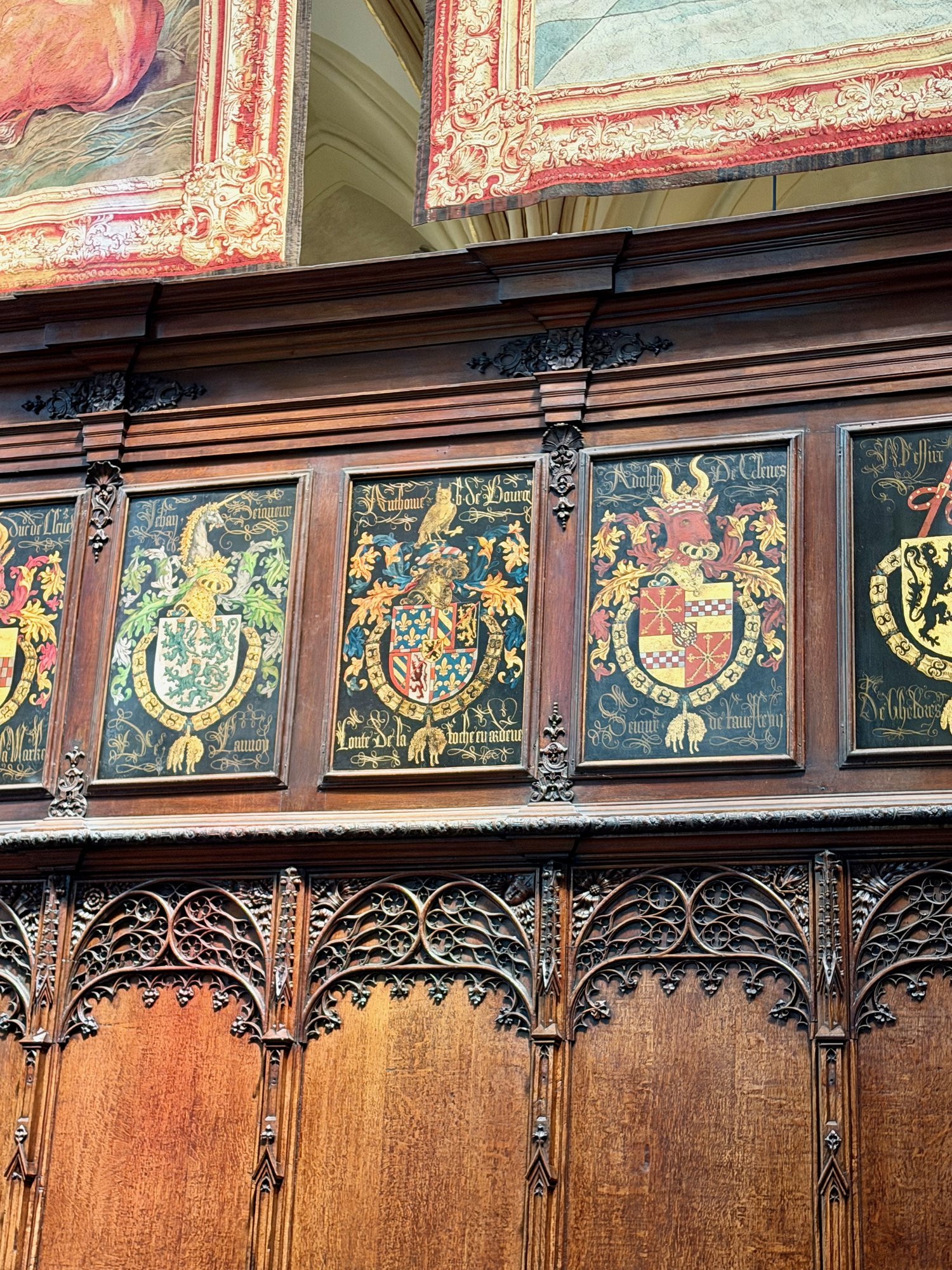 Coats of arms of the Knights of the Golden Fleece on the choir stalls, St Saviour's Cathedral, Bruges. Photo by JFPenn