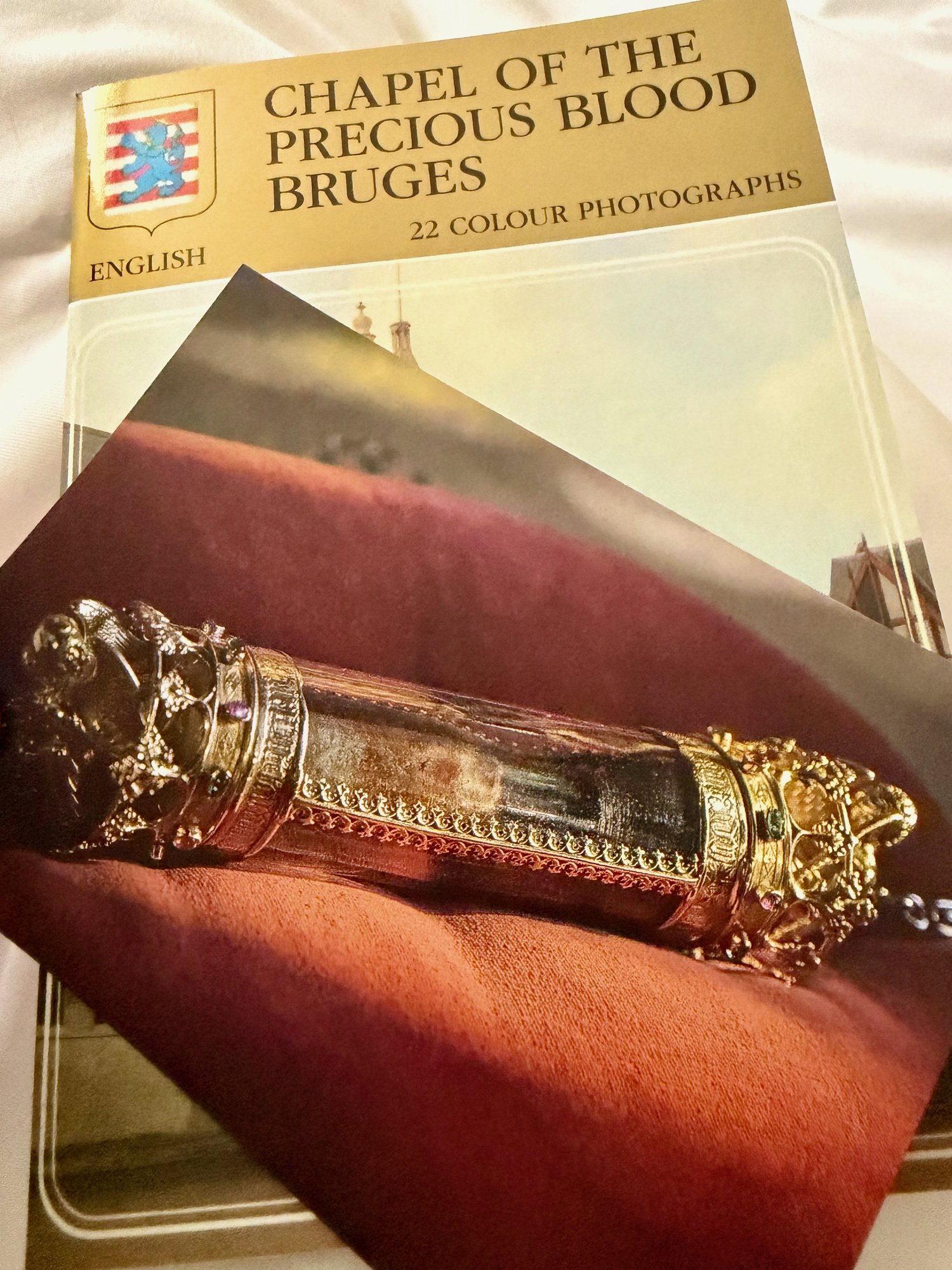 Chapel of the Precious Blood guidebook and postcard of the relic, Bruges. Photo by JFPenn