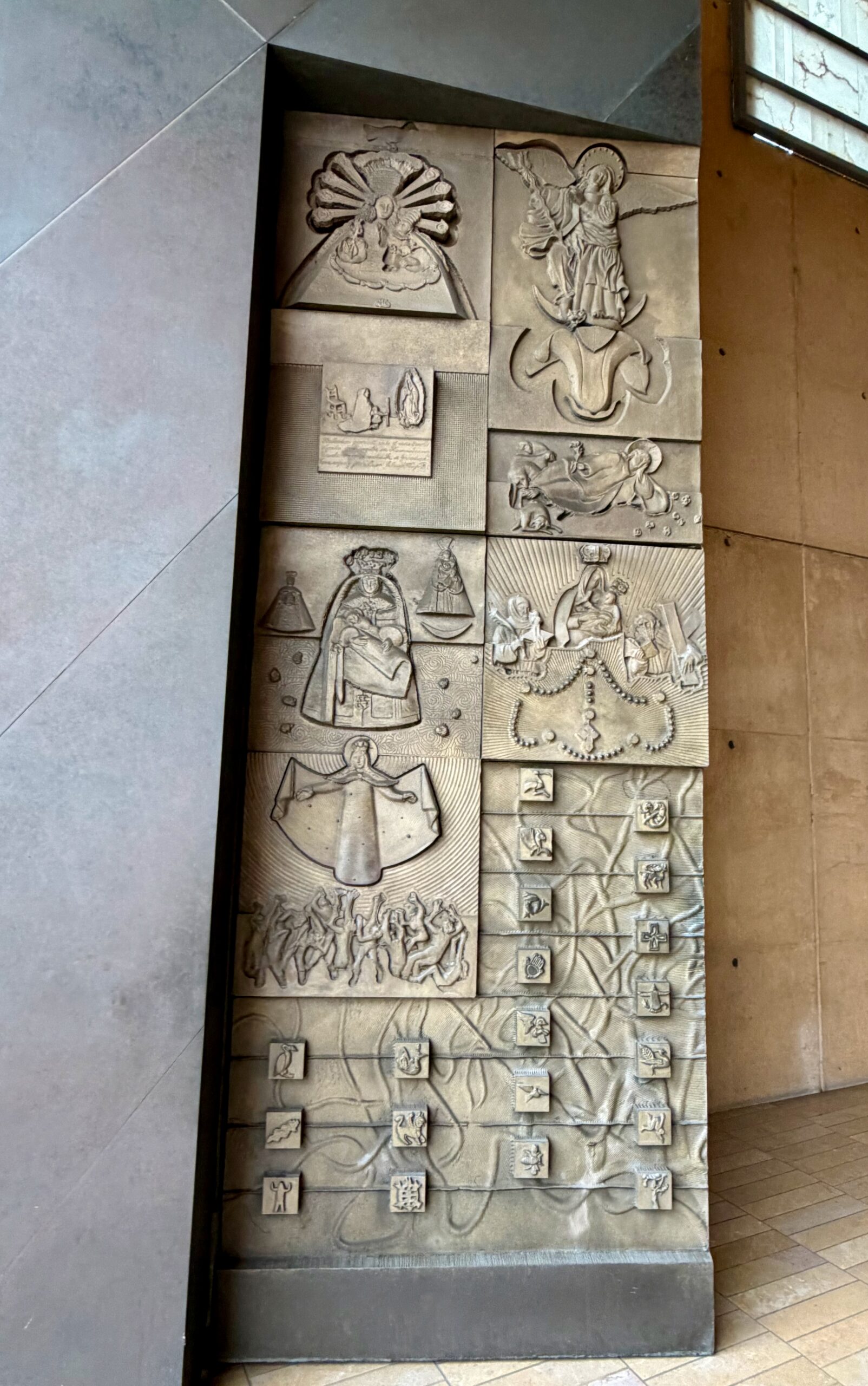 Images of the Virgin on the inner bronze door, Cathedral of Our Lady of the Angels. Photo by JFPenn