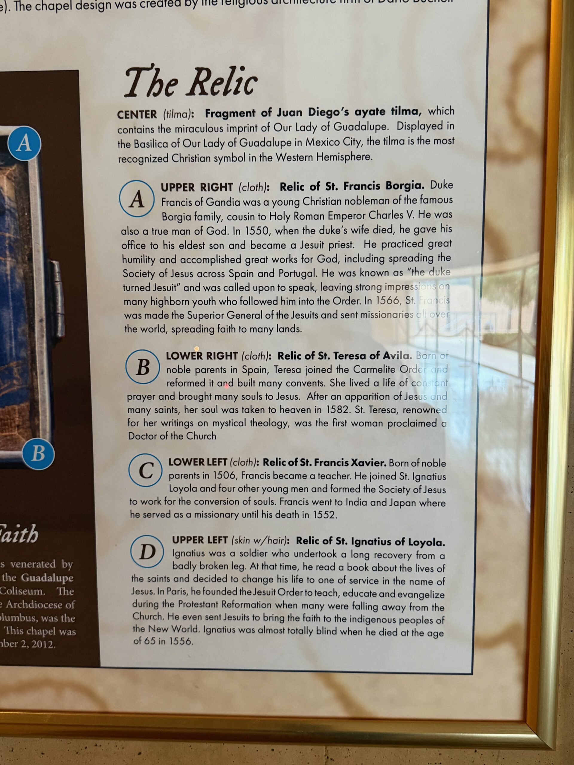 Panel listing the relics in the Tilma chapel reliquary, Cathedral of Our Lady of the Angels. Photo by JFPenn
